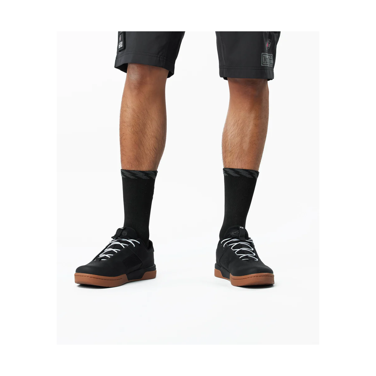 Calcetines MTB de bicicleta Muc-Off técnicos color negro en zapatilla